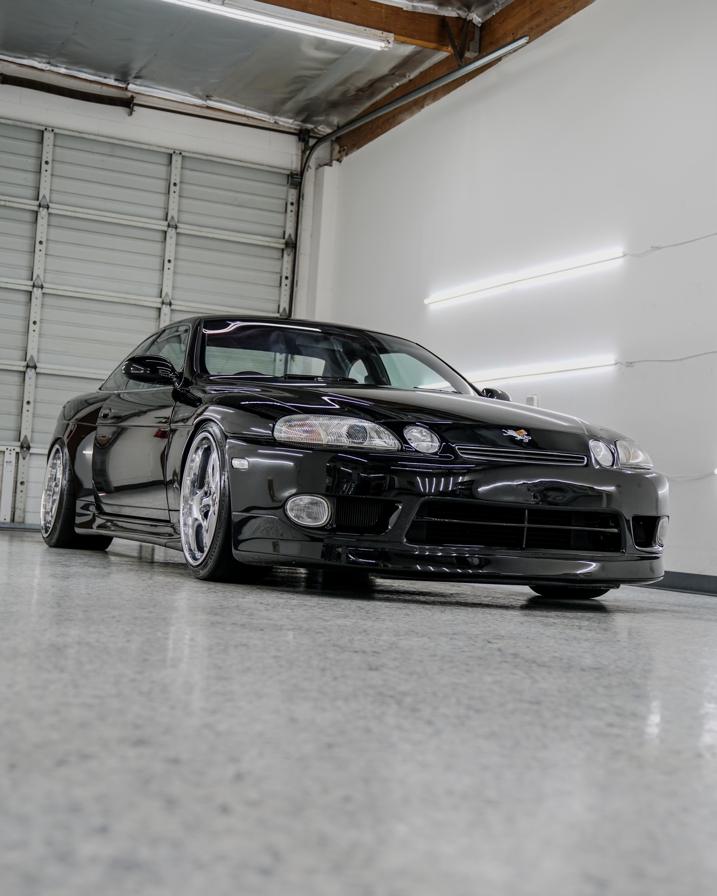 Black Toyota Soarer in detailing studio